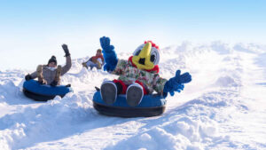 Known for being one of the longest and steepest snow tubing hills in North America, Parrot Mountain, located at Margaritaville at Lanier Islands’ License to Chill Snow Island, measures 575-feet-long and eight stories high. | Photo Credit: Lake Lanier CVB